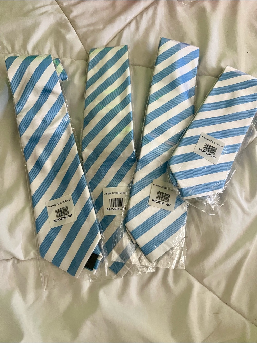 Sky Blue and White Striped Ties 
Can be used as an Argentinian tie. New
